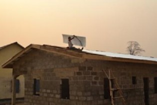 placing zinc roof piece